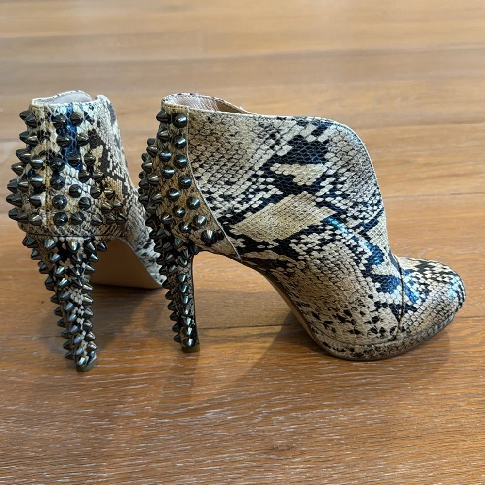 BCBGMaxAzria Daria spiked embossed snakeskin python print leather bootie